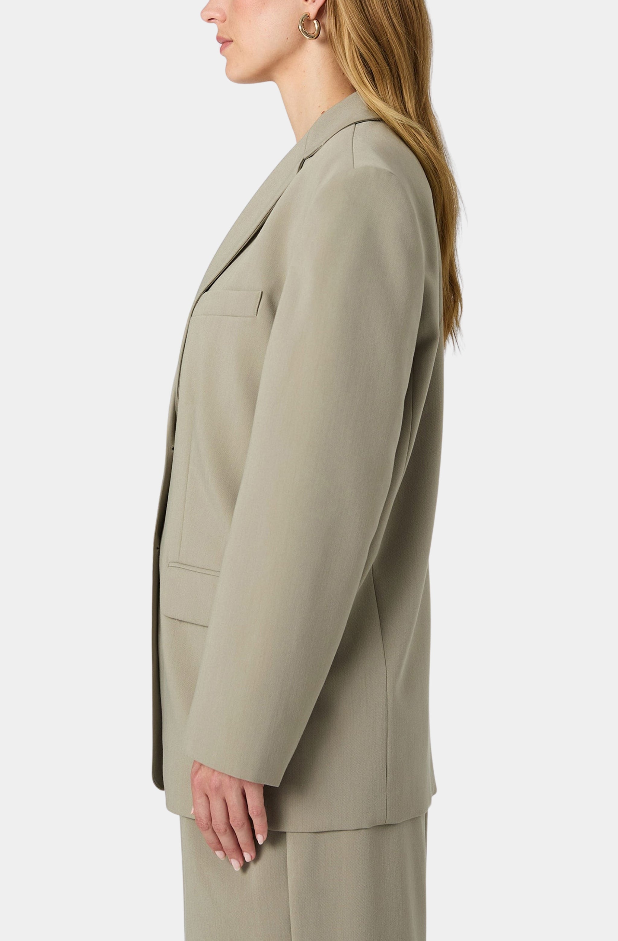 Side profile of Azra Twill Blazer with welt pockets