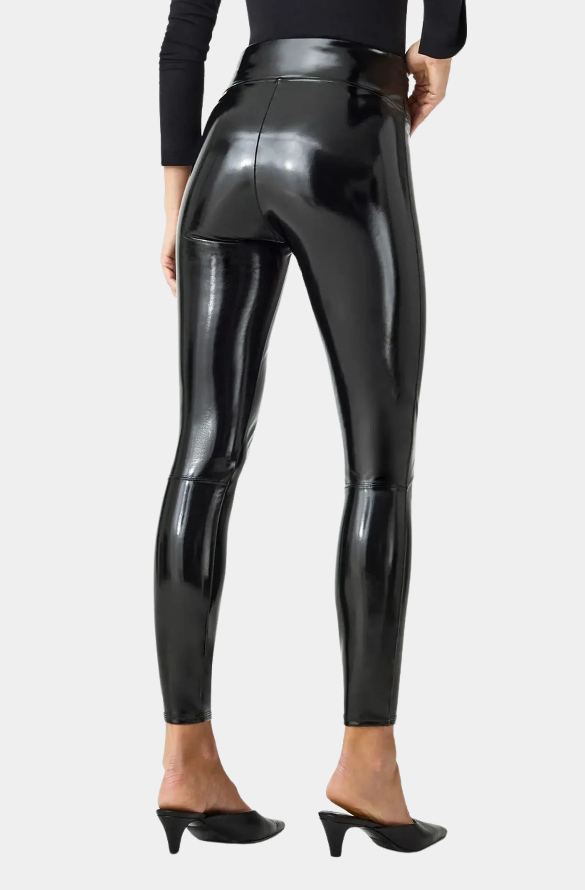 Back view of black patent leather leggings