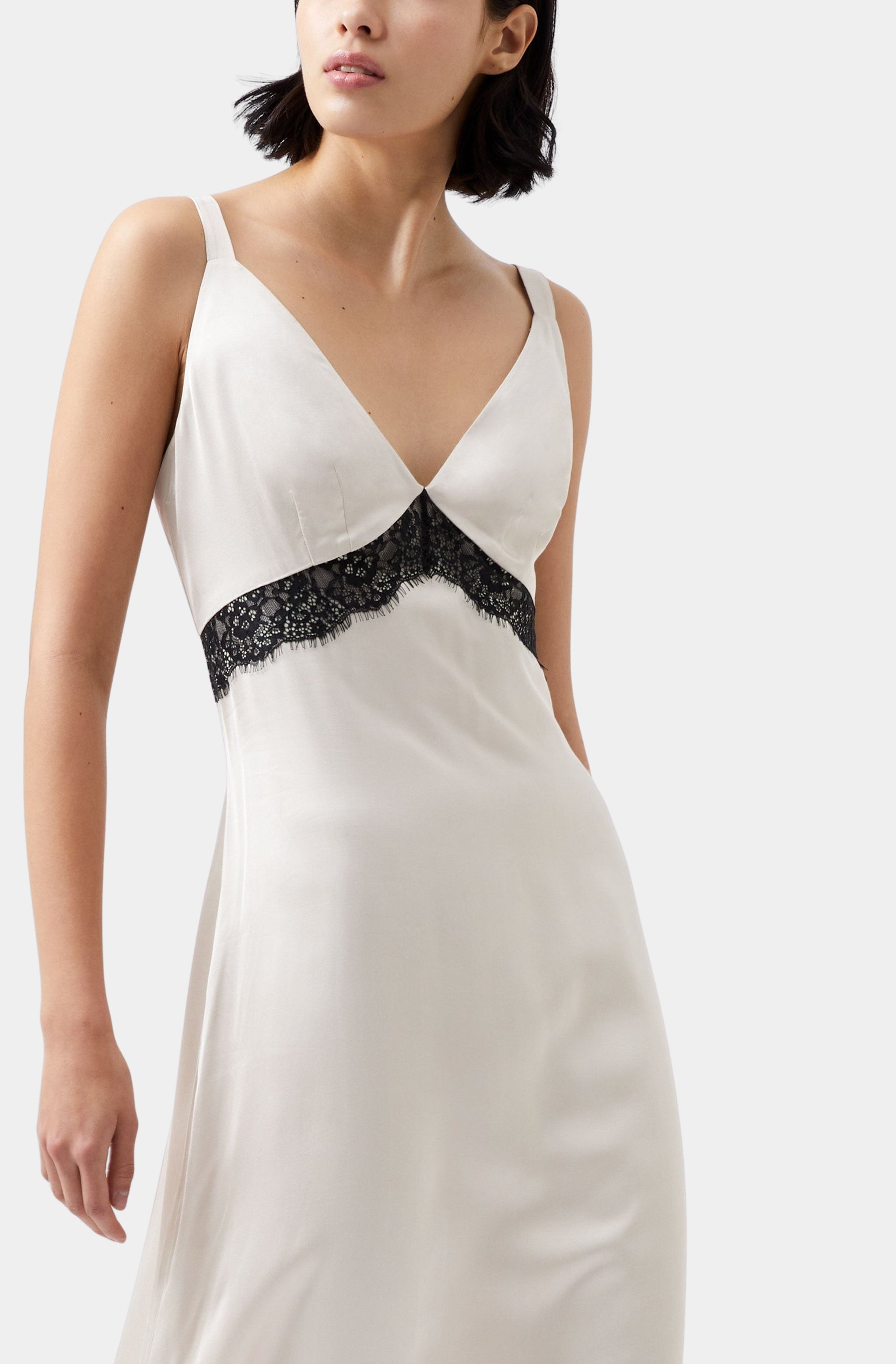 Close-up of Ennis Satin Lace Dress with black lace trim