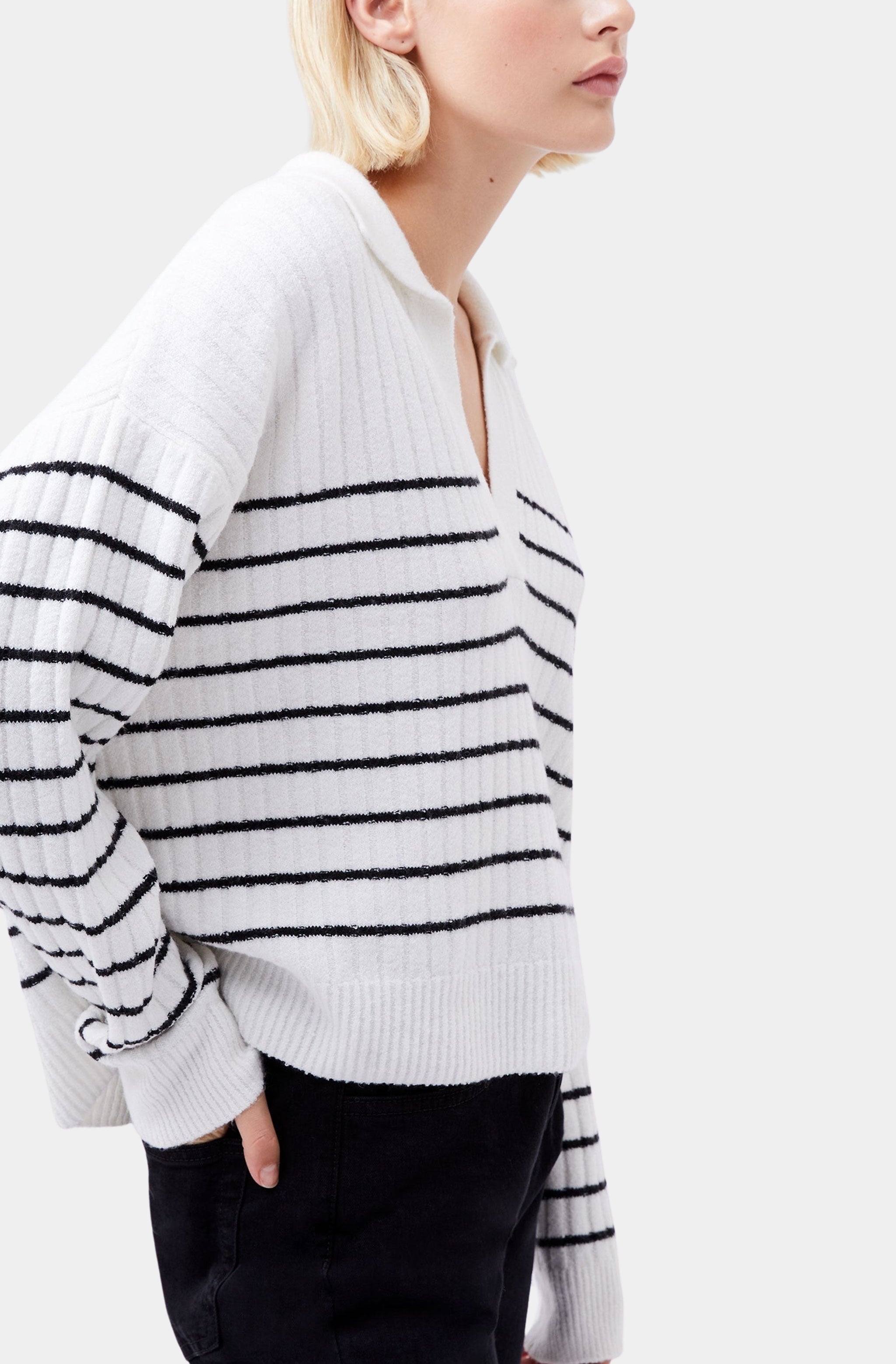 Side profile of striped sweater with collar