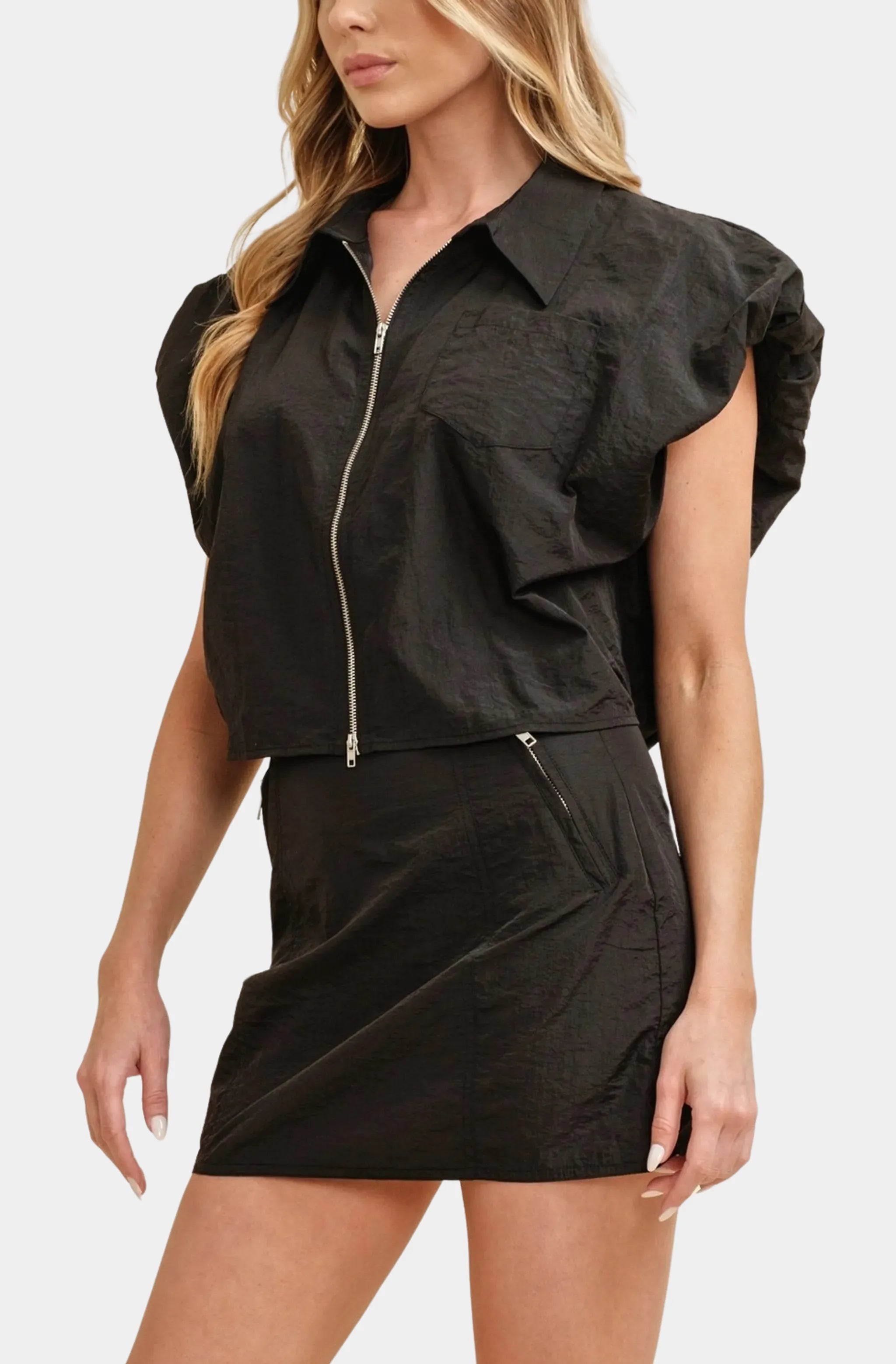 Black Nanette Top with zip front and bubble hem