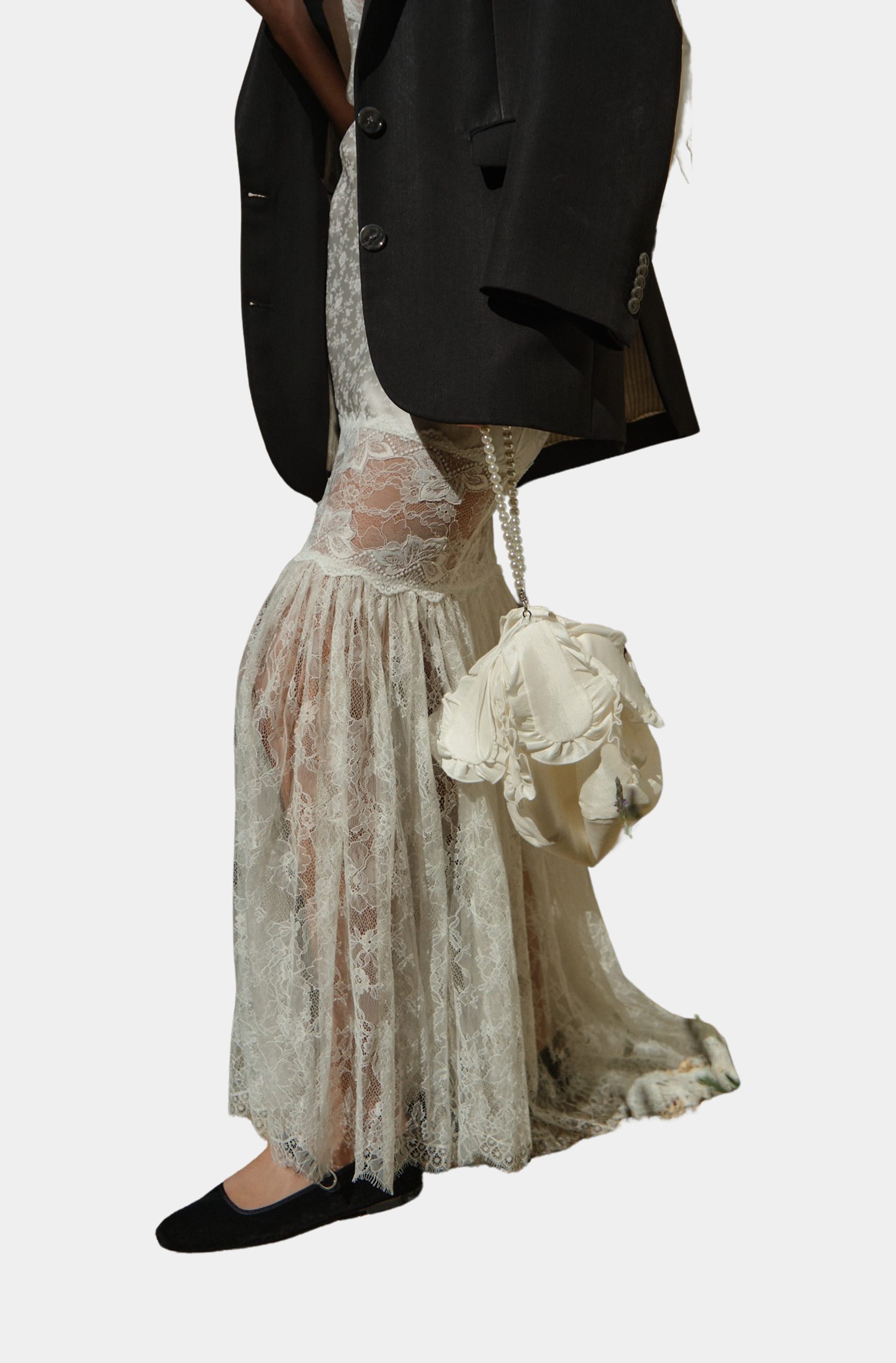 Side view of Cleopatra bridal pouch purse with formal attire