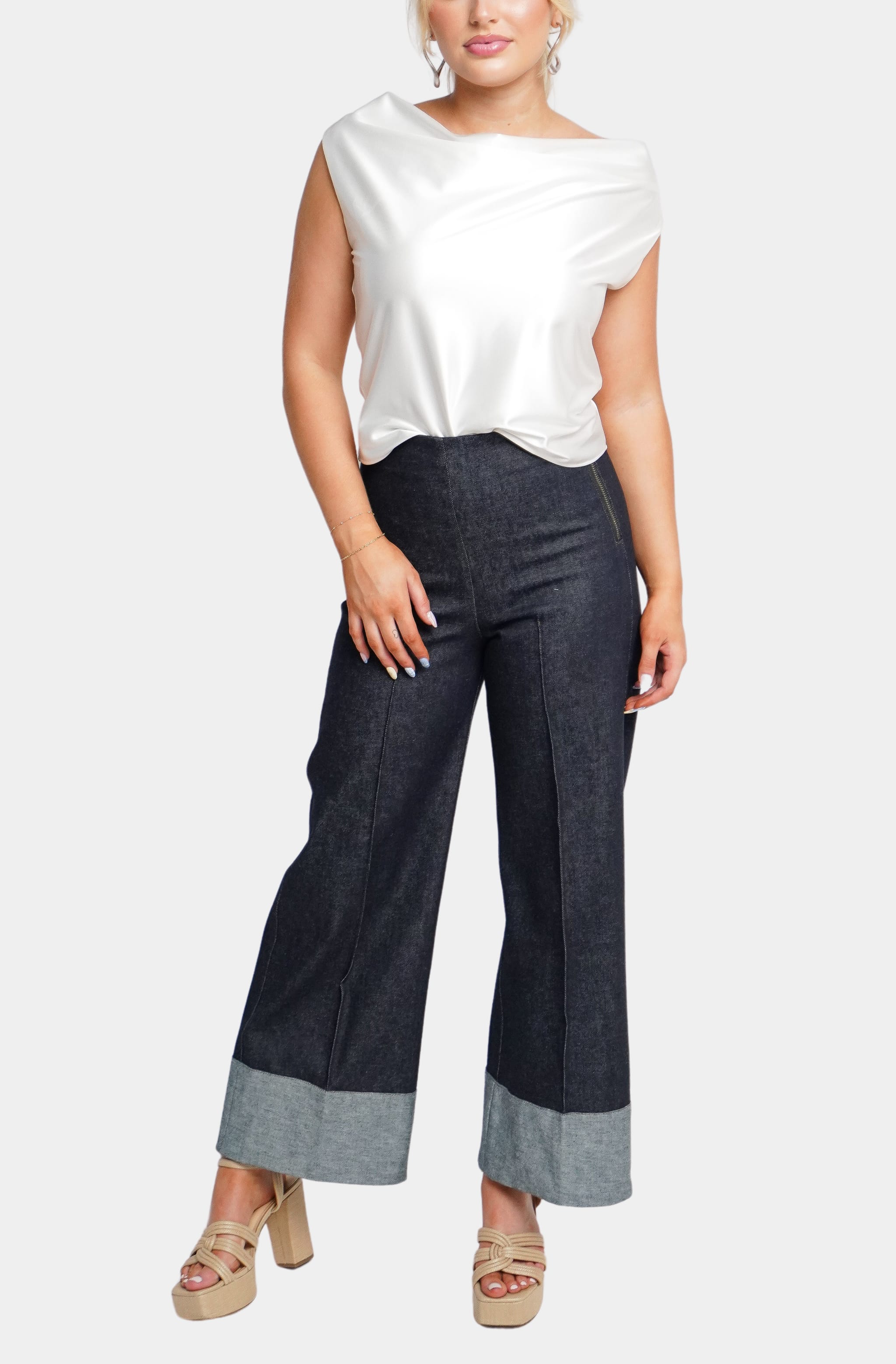 White satin Isle Top with wide-leg denim pants