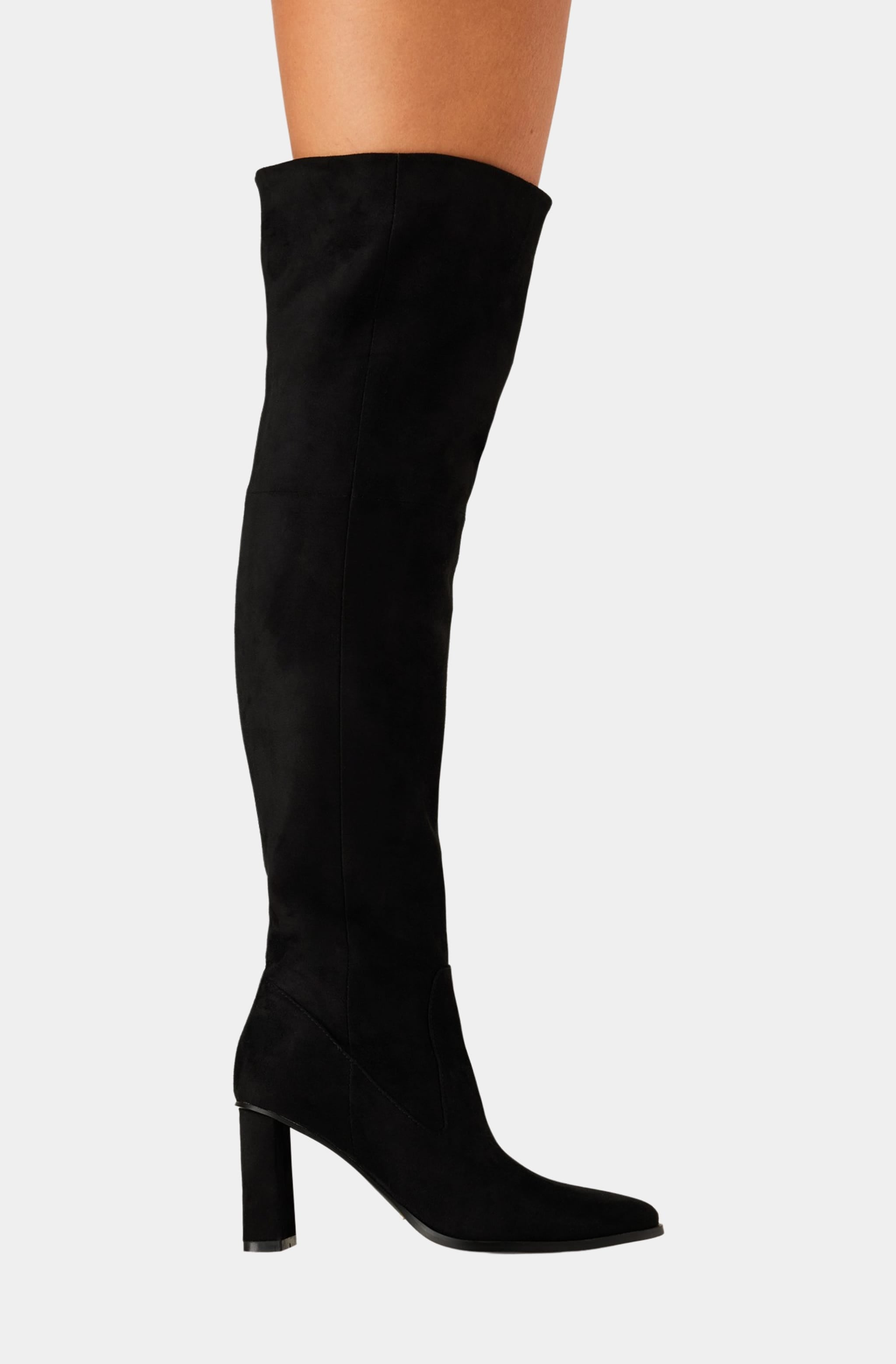 Side profile of worn black knee-high Tova Boot