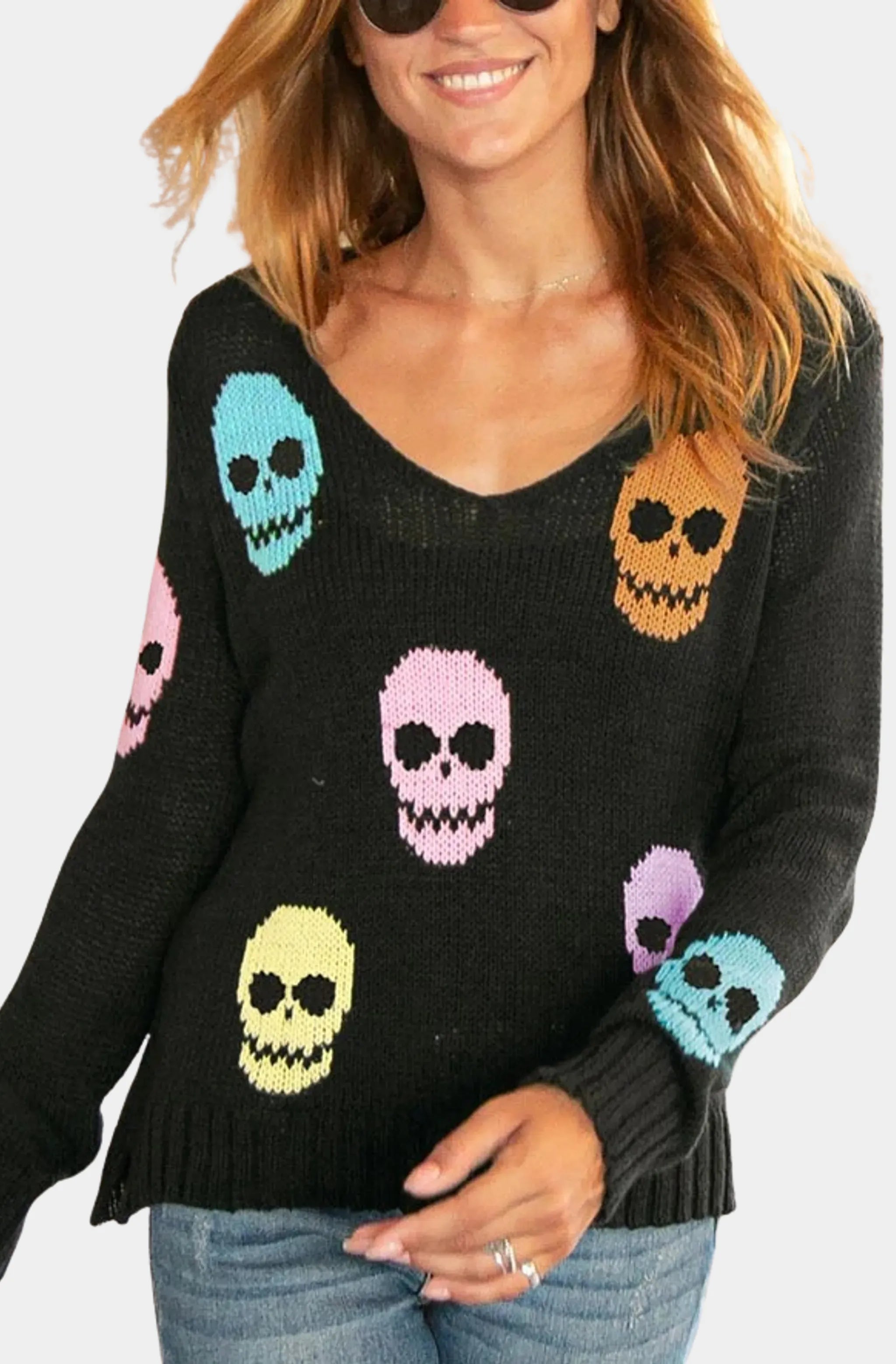 Gothic-style sweater with colorful skull graphics