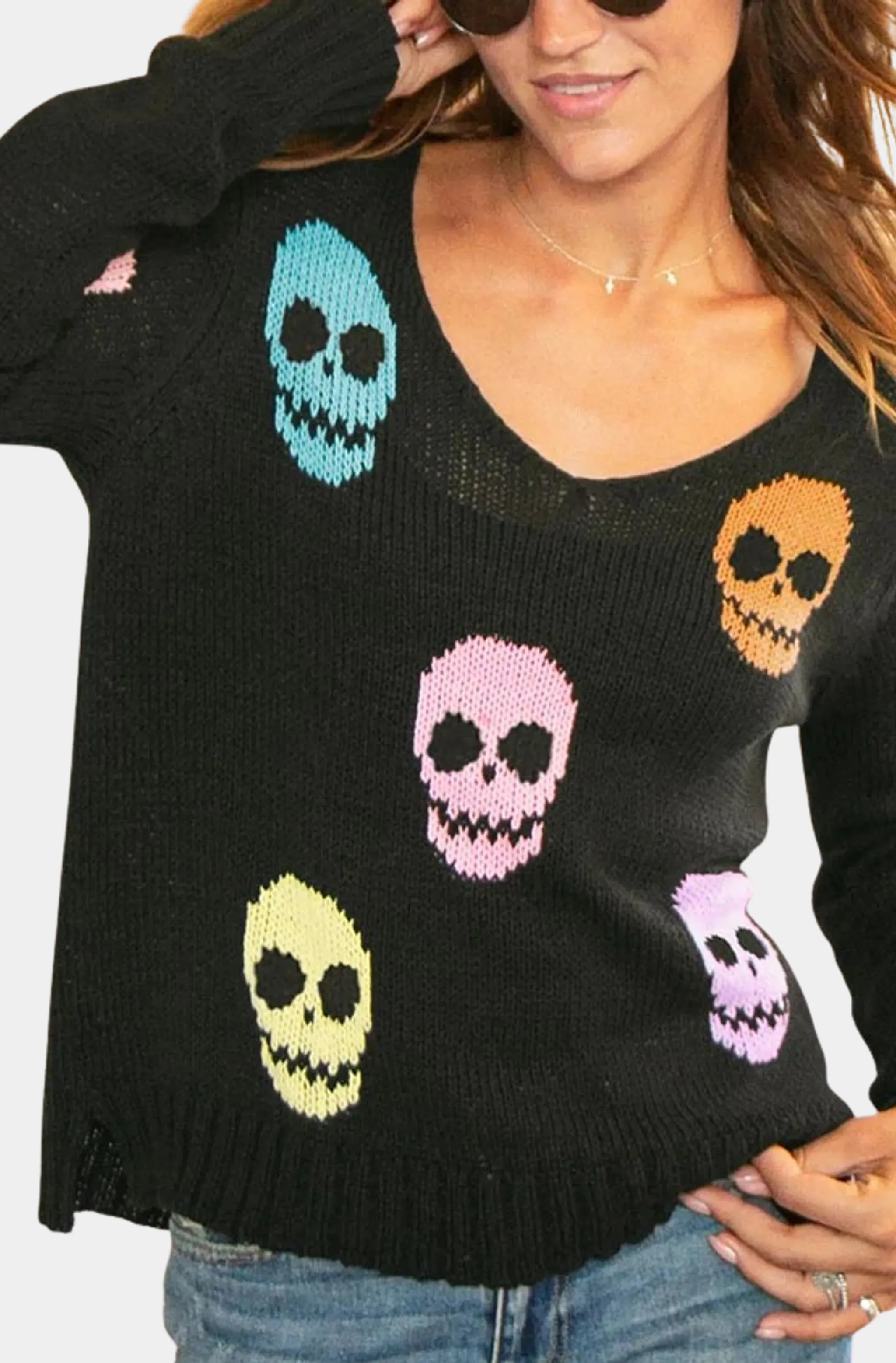 Multiple skulls sweater featuring bold skull designs