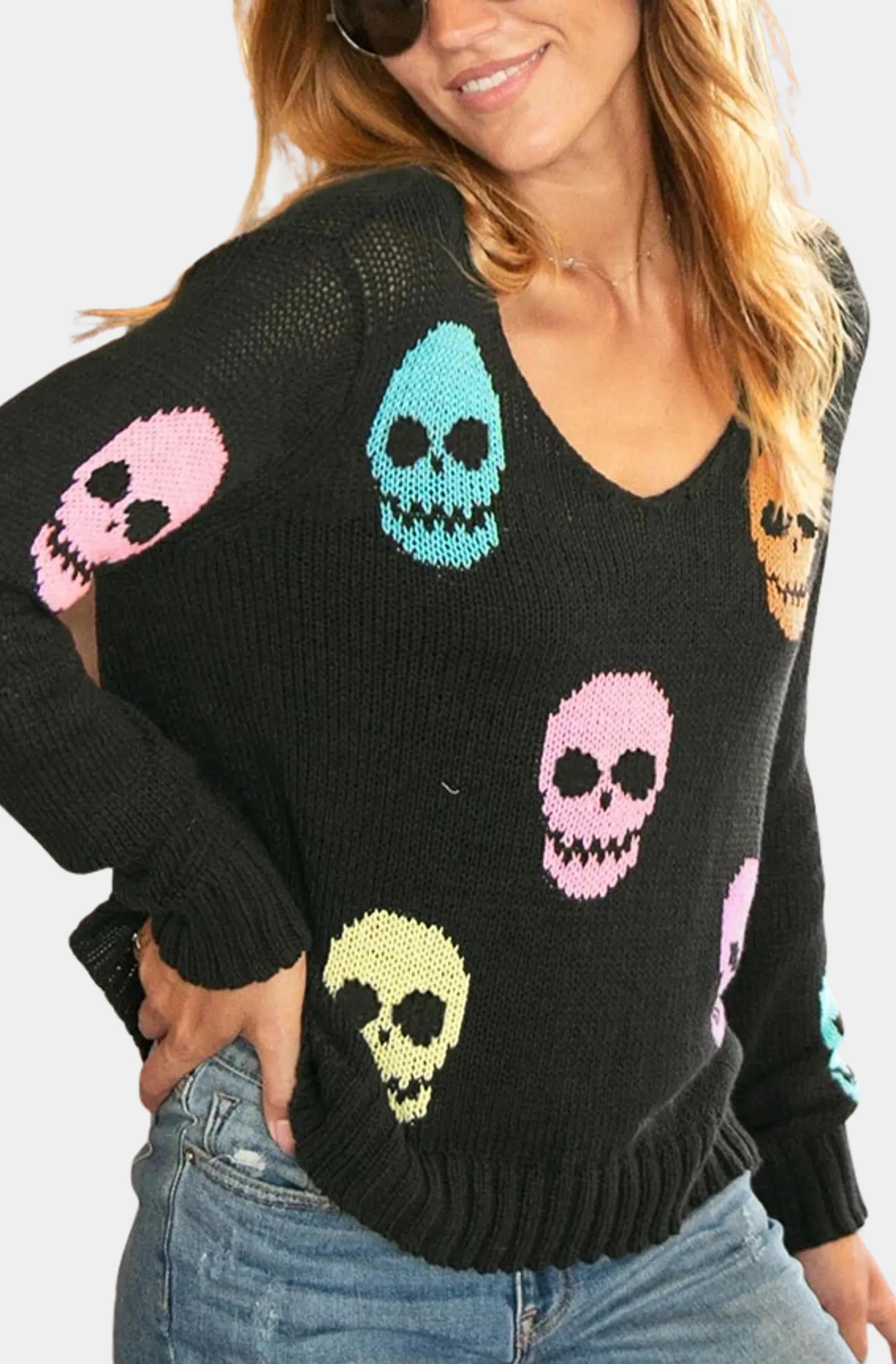 V-neck sweater with vibrant skull patterns